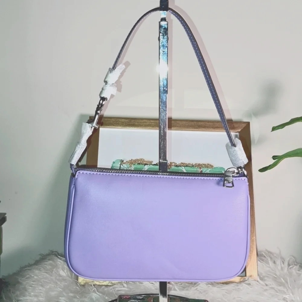 Coach NWTs Nolita 19 in light violet